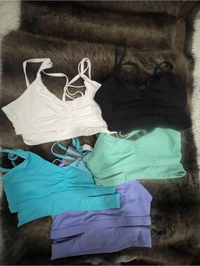 NVGTN Pack of 5 Strappy Sports Bras in White, Black, Aqua, Mint, Lavender